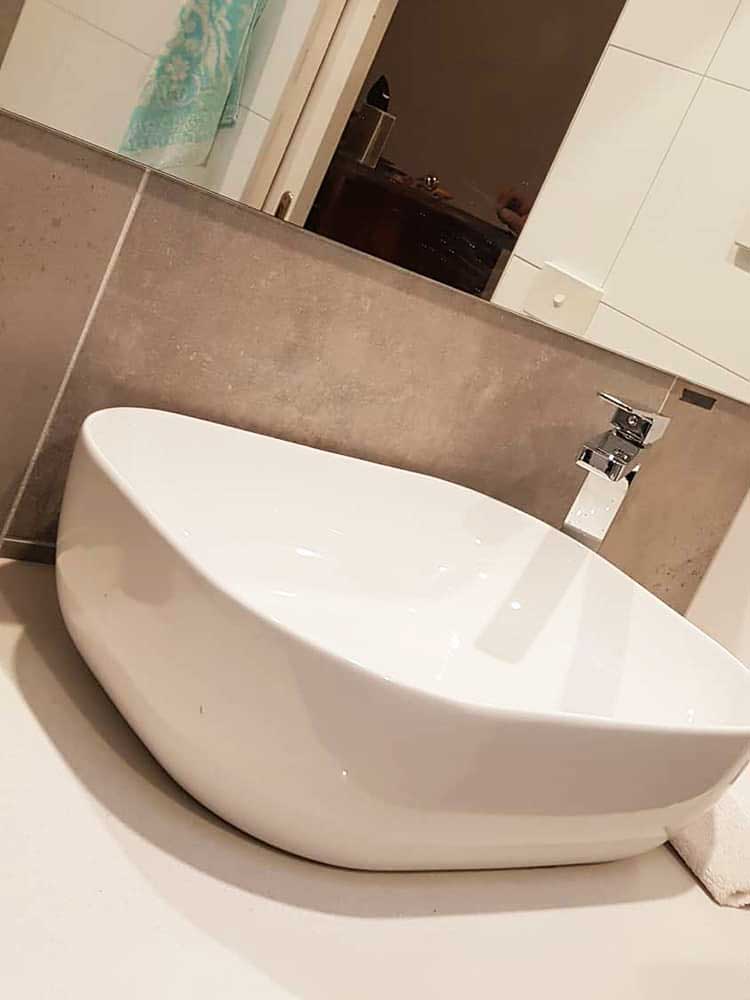 Bathroom Renovation in Melbourne with White porcelain sink