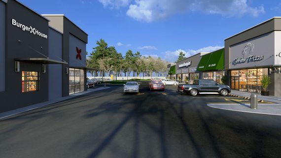 An artist 's impression of a shopping center with cars parked on the side of the road.