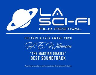 White lettering against a mid-blue background depicting the L.A Sci-Fi Film Festival Polaris Silver Award 2020 for The Martian Diaries - Best Soundtrack