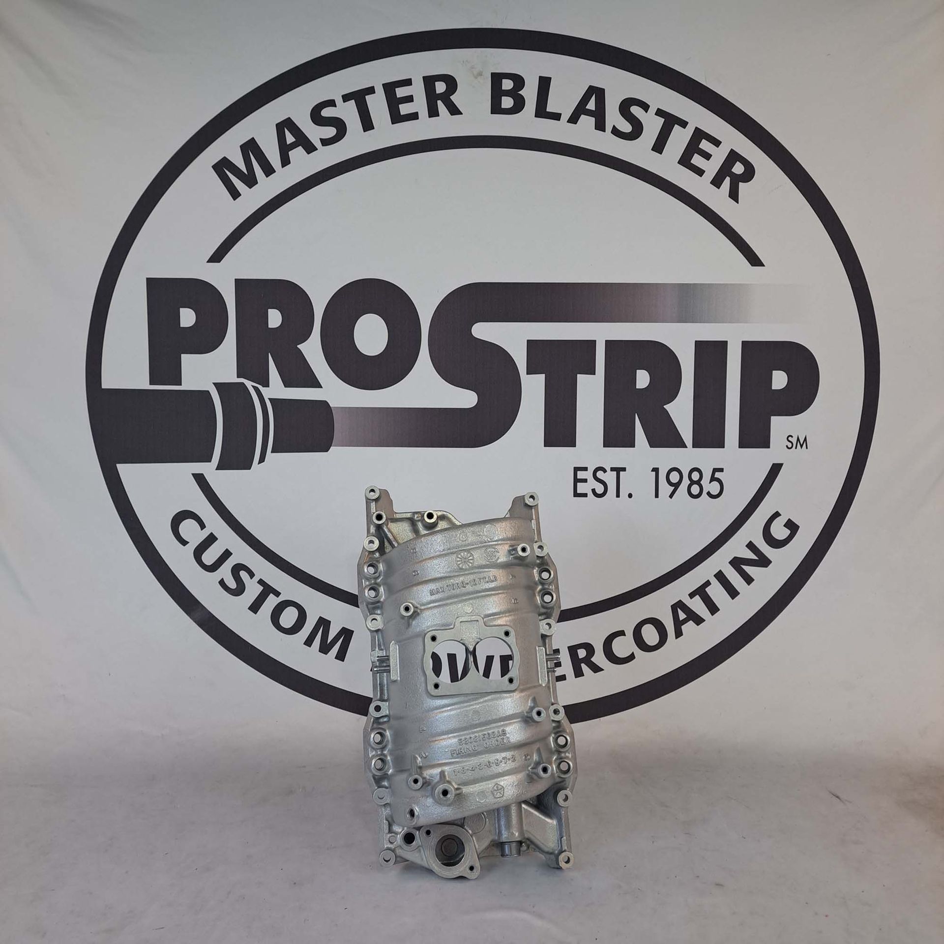 A master blaster logo with a prostrip logo on it