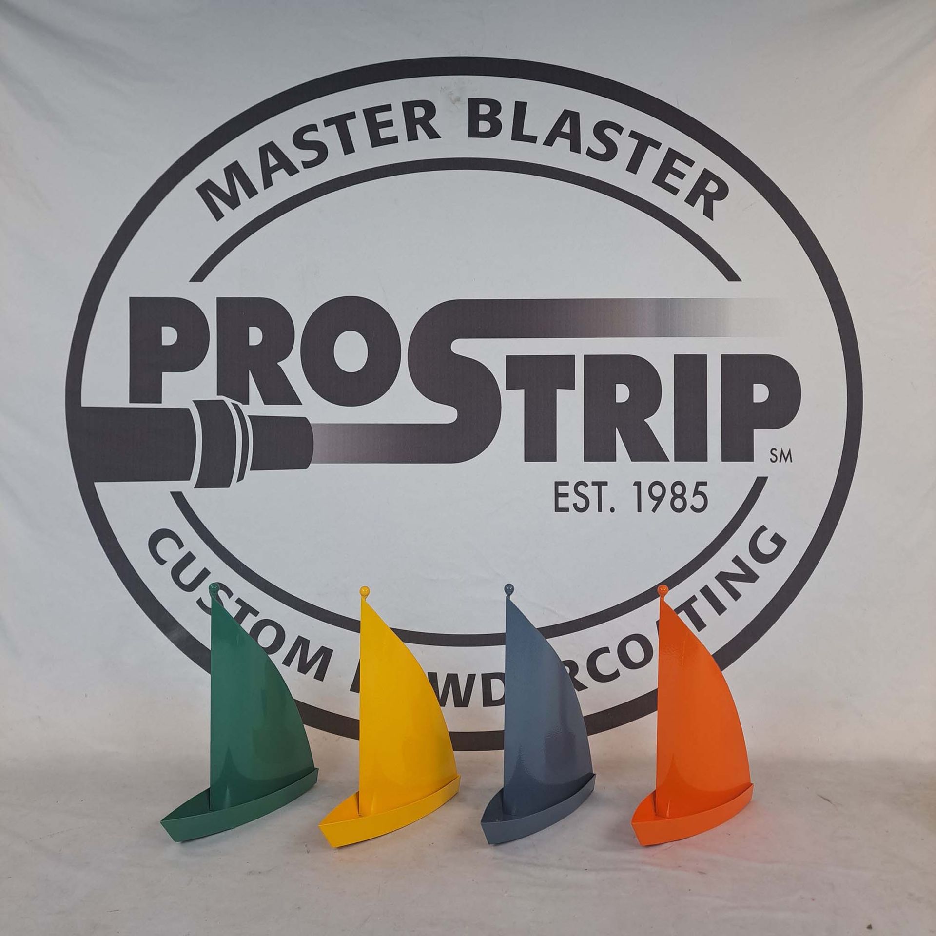 A logo for master blaster prostrip custom welding and coating