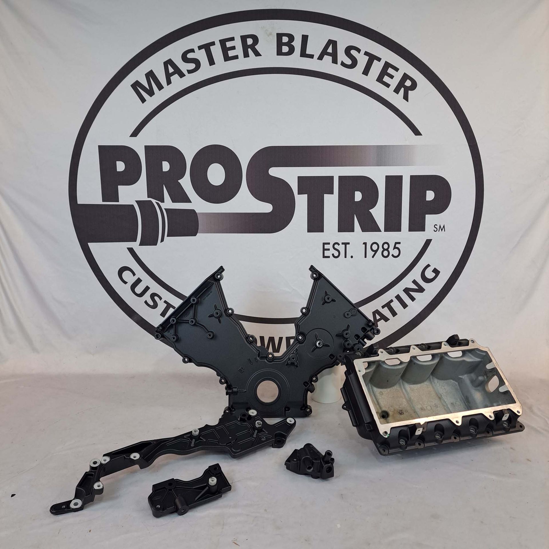 A logo for master blaster prostrip is on a white background