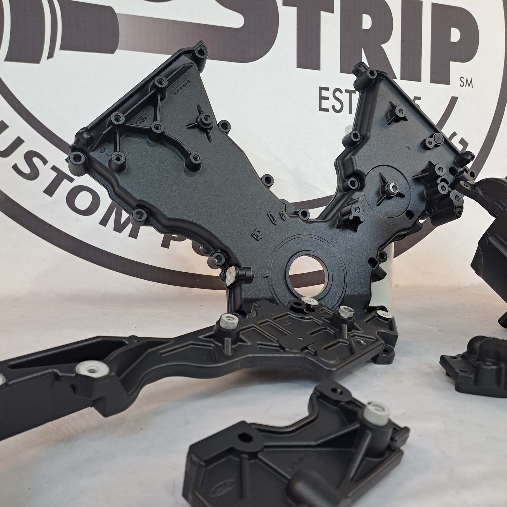 The word strip that is on a white sign