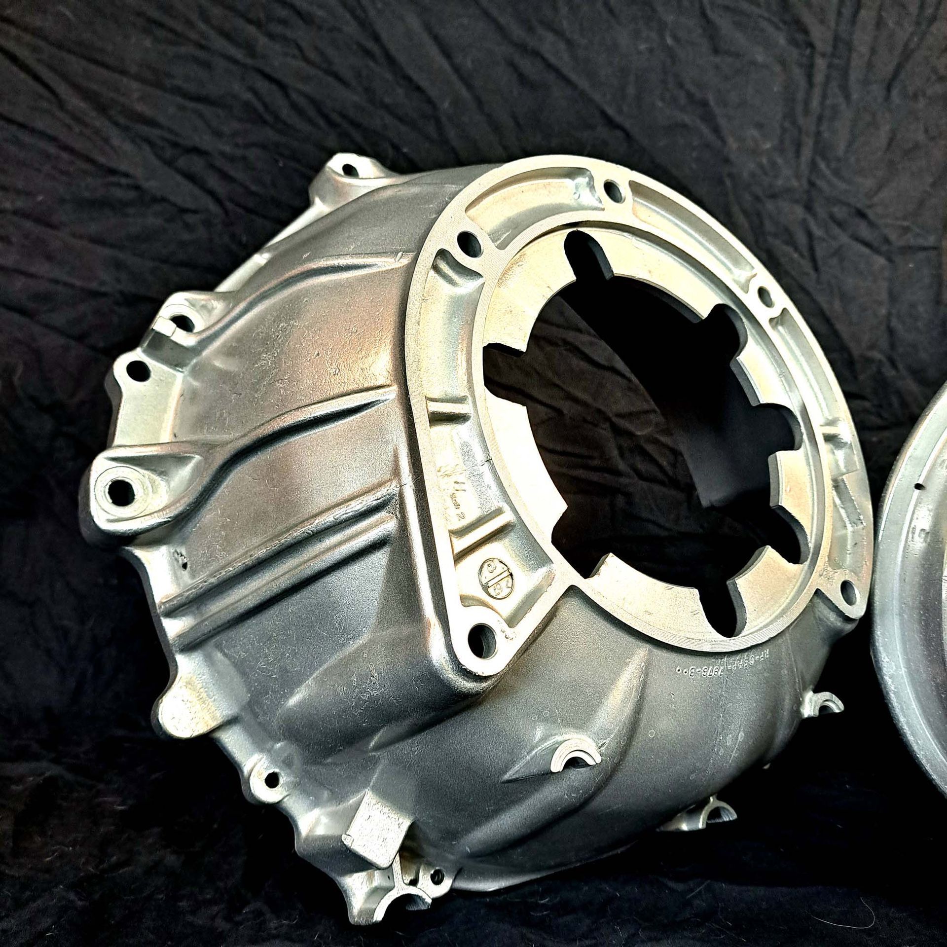 A close up of a metal object with holes in it