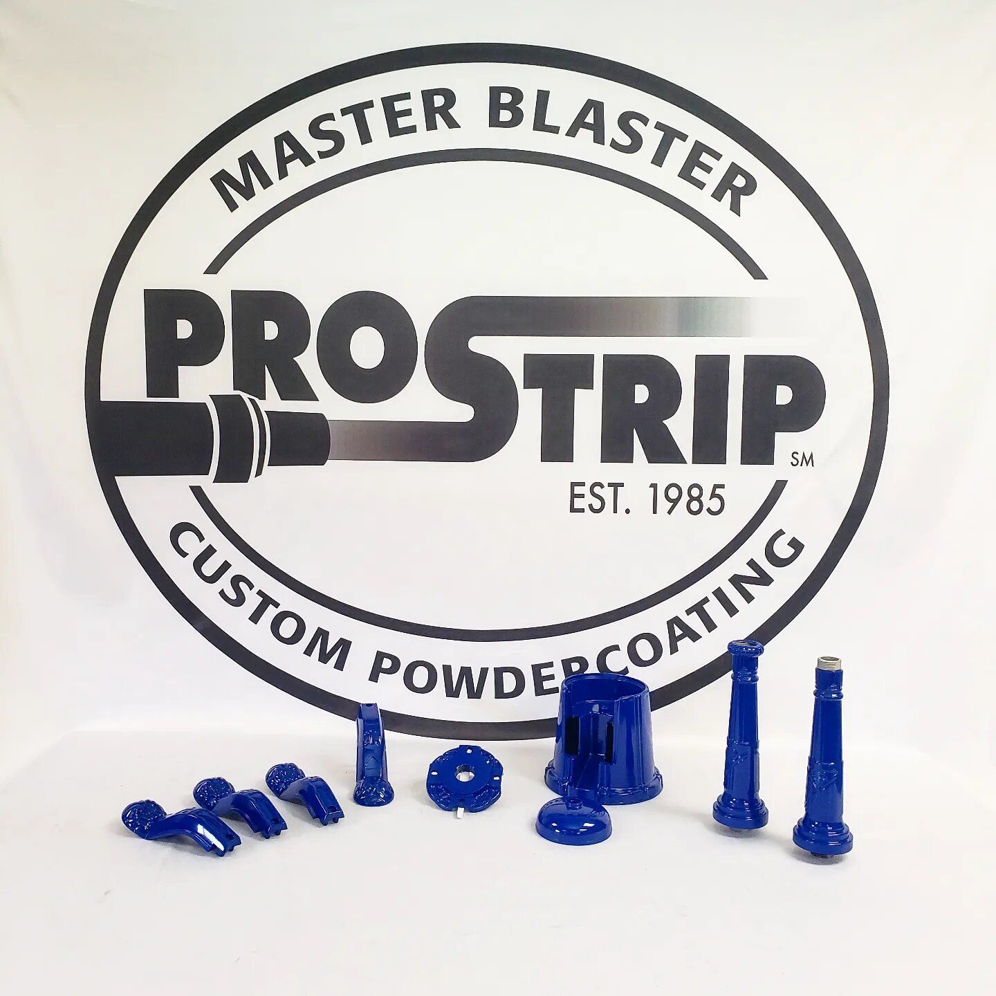 A logo for master blaster prostrip custom powder coating