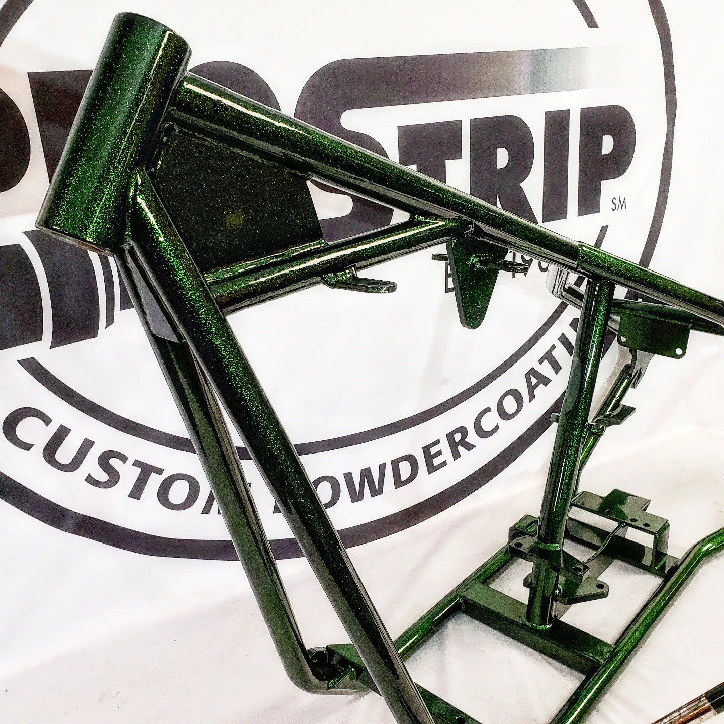 Green Motorcycle Front Frame — Fort Wayne, IN — ProStrip Professional Metal Refinishing, Inc.