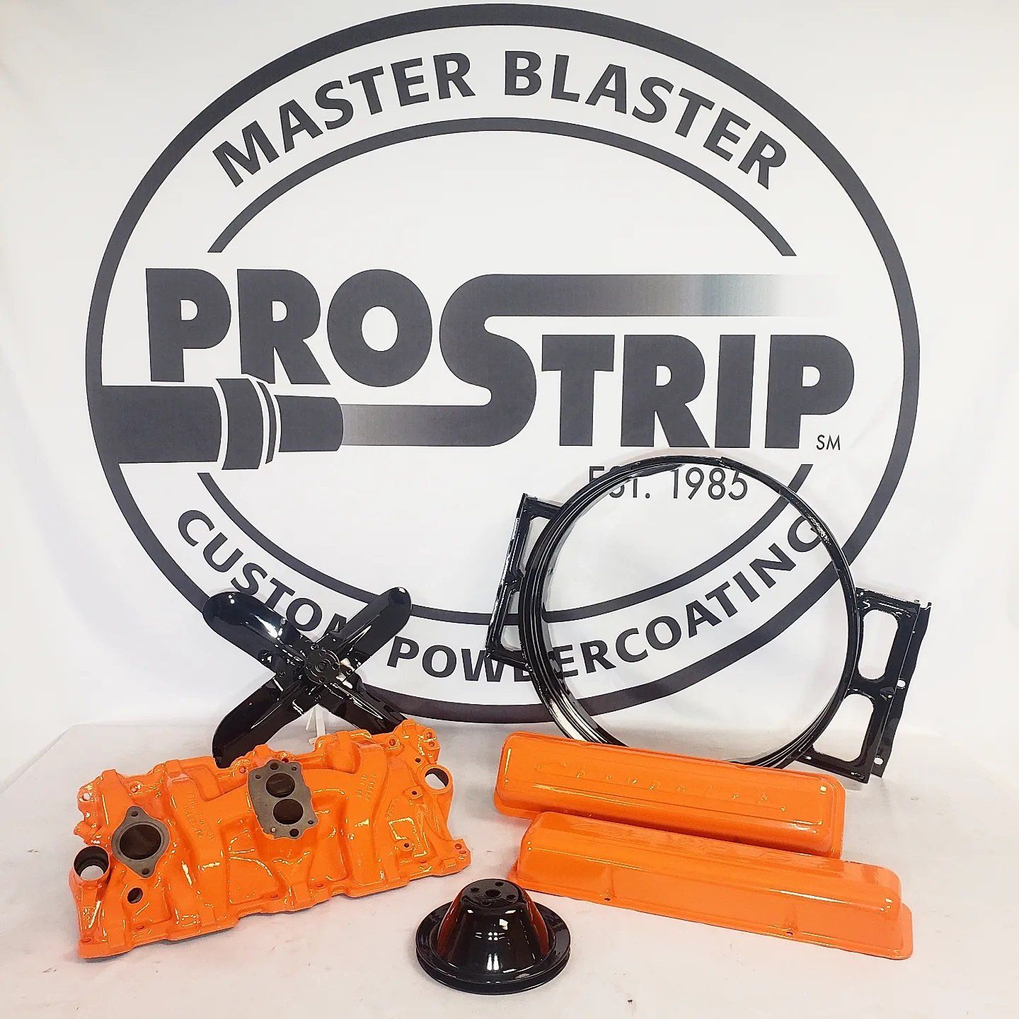 A logo for master blaster prostrip custom power coating
