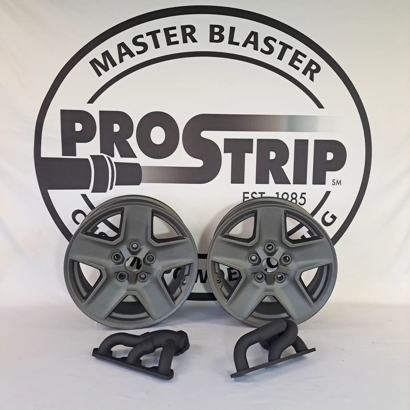 Gray Coated Car Wheels — Fort Wayne, IN — ProStrip Professional Metal Refinishing, Inc.