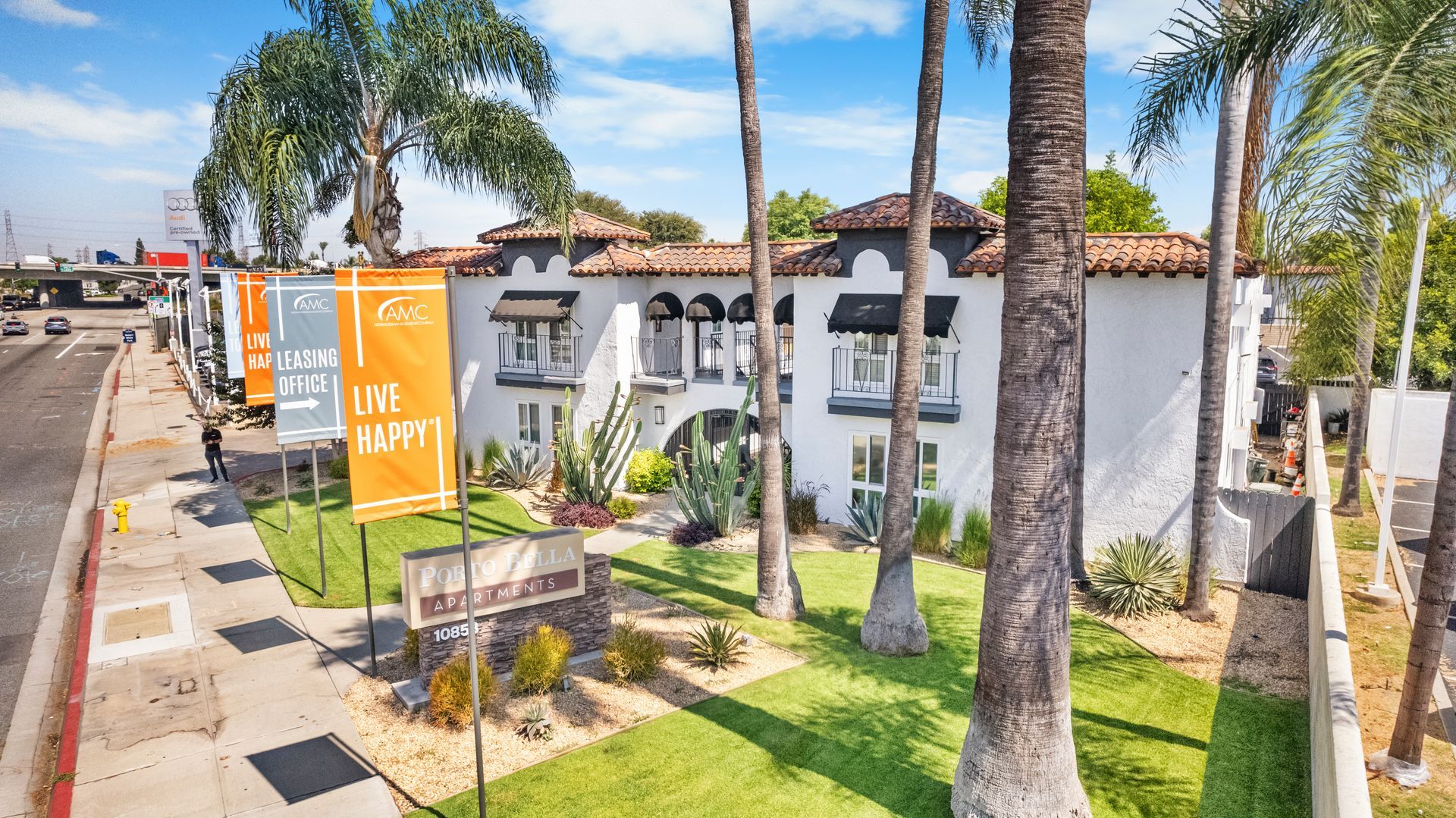 view of building exterior and flags