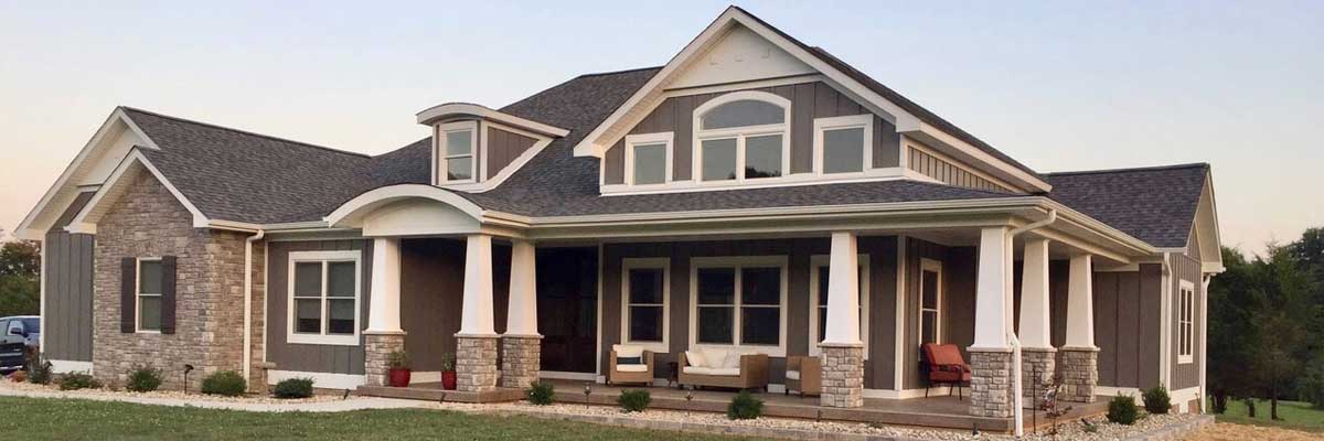 Home Builder - Front of a house with coach outside in Marion, IL