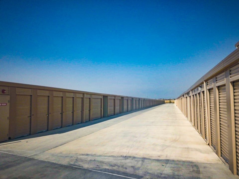 a row of storage units with a door that says do not enter