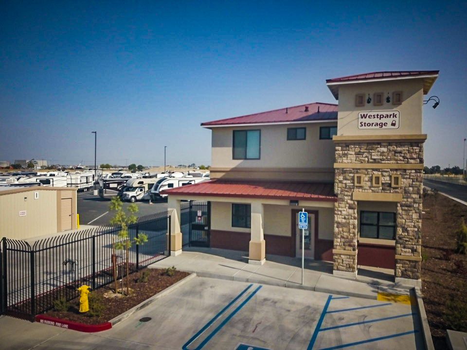 a building with a sign that says westpark storage