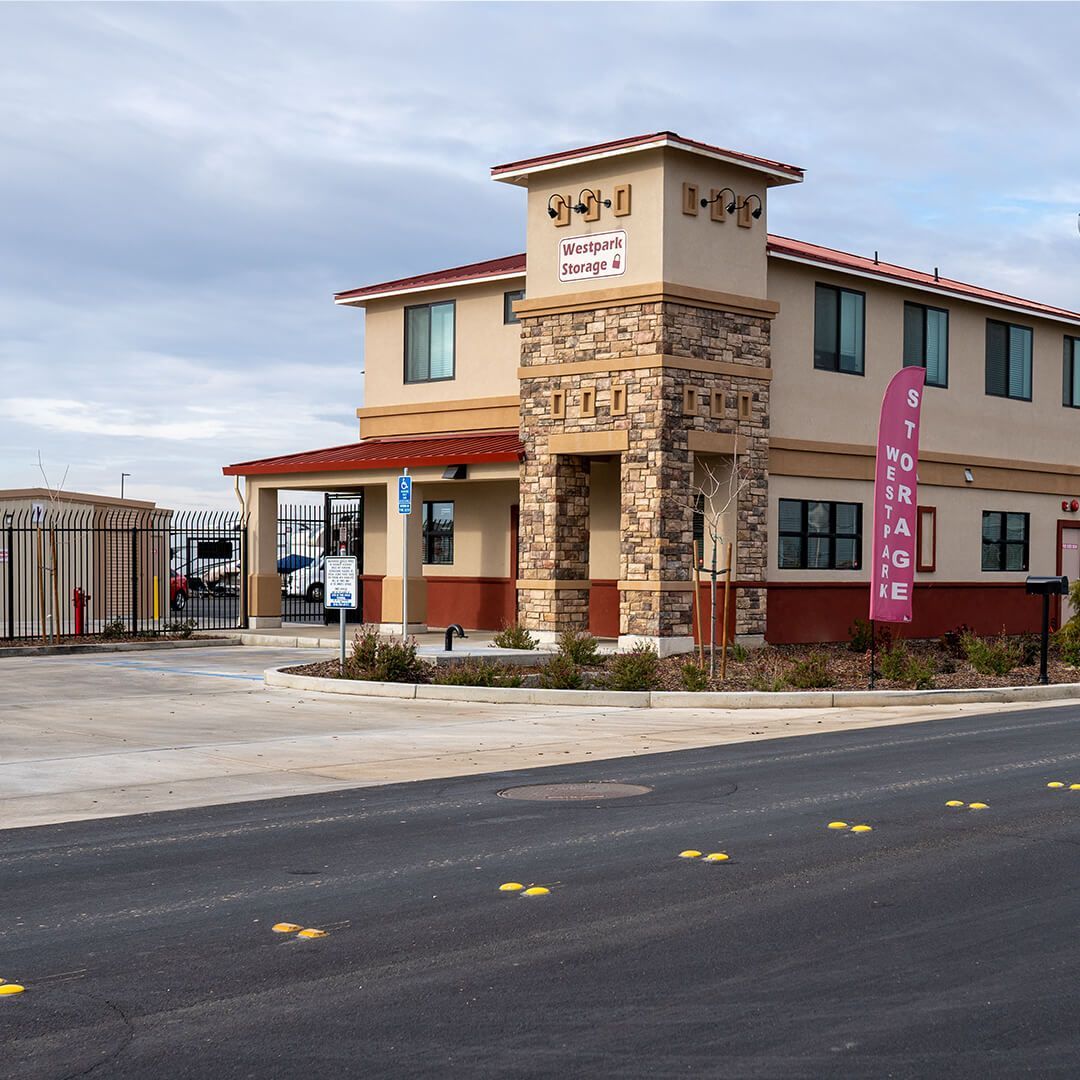 a building with a sign that says westpark storage