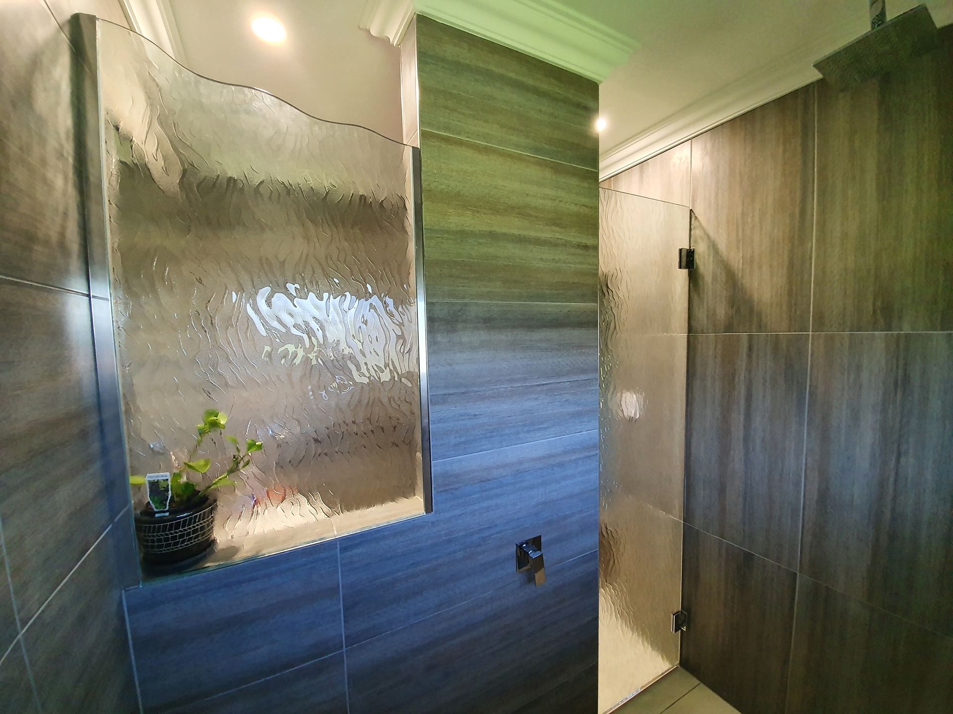 Bathroom With Patterned Tile Walls — Innisfail Glass & Aluminium in Innisfail, QLD