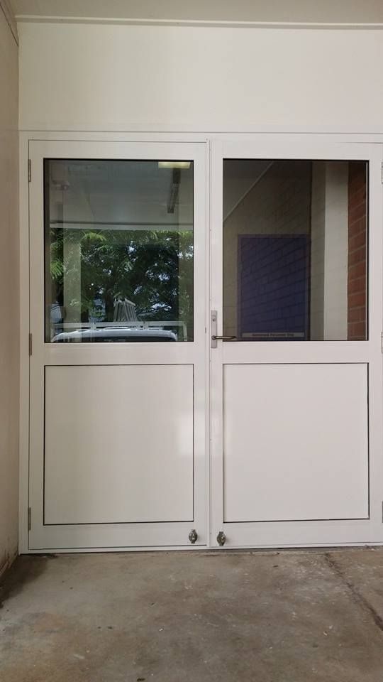 White Double Doors With Glass Panels — Innisfail Glass & Aluminium in Innisfail, QLD