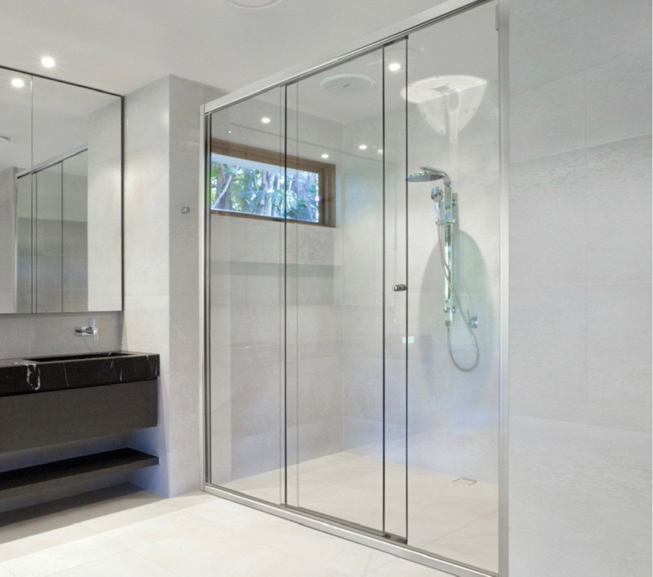 Modern Bathroom With Sliding Glass Shower Doors — Innisfail Glass & Aluminium in Innisfail, QLD