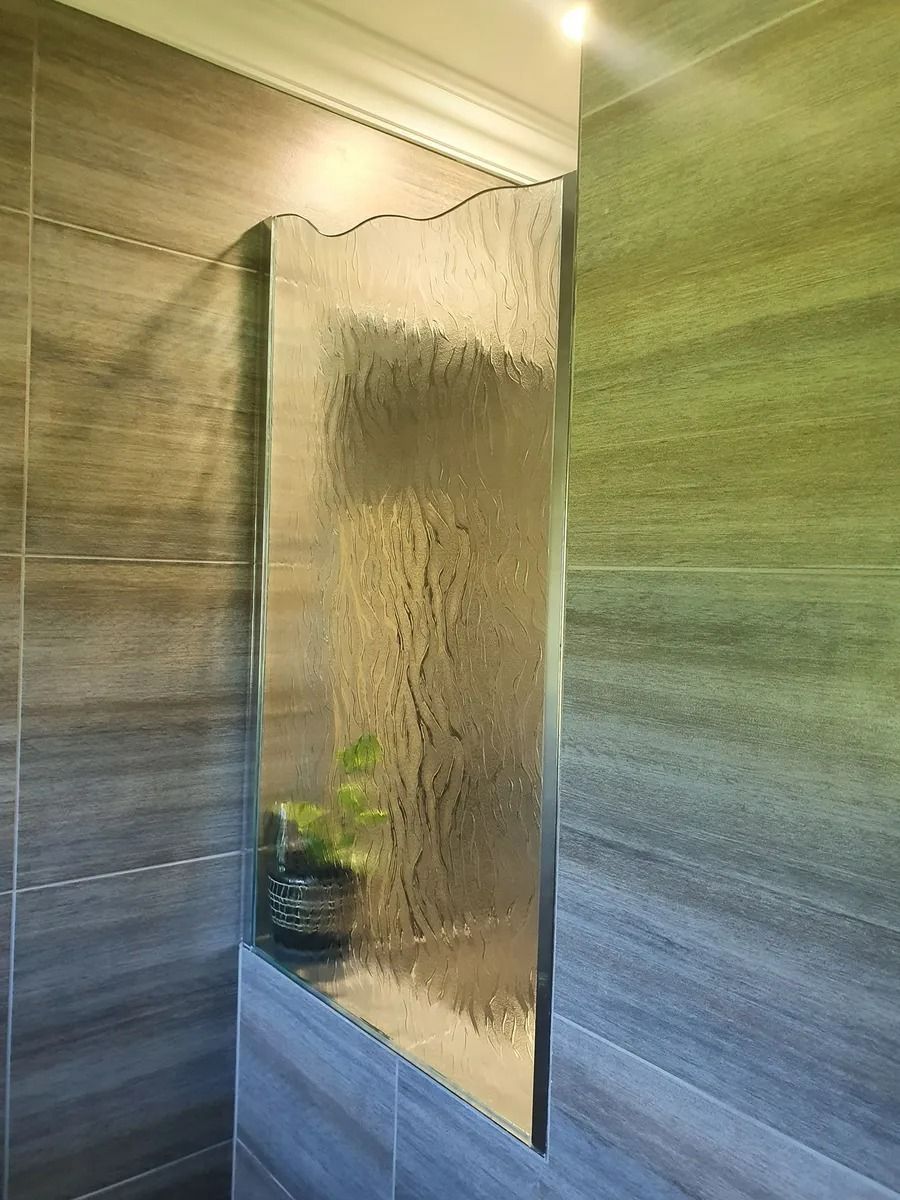 Shower With Wavy Glass Divider and Tiled Walls — Innisfail Glass & Aluminium in Innisfail, QLD