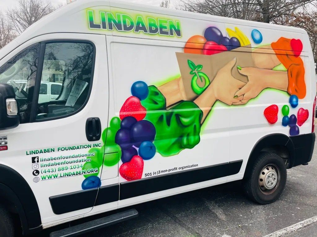 A white van with the word lindaden painted on it