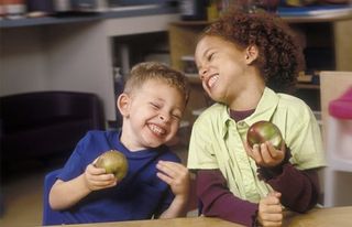 kids enjoying their fruit 