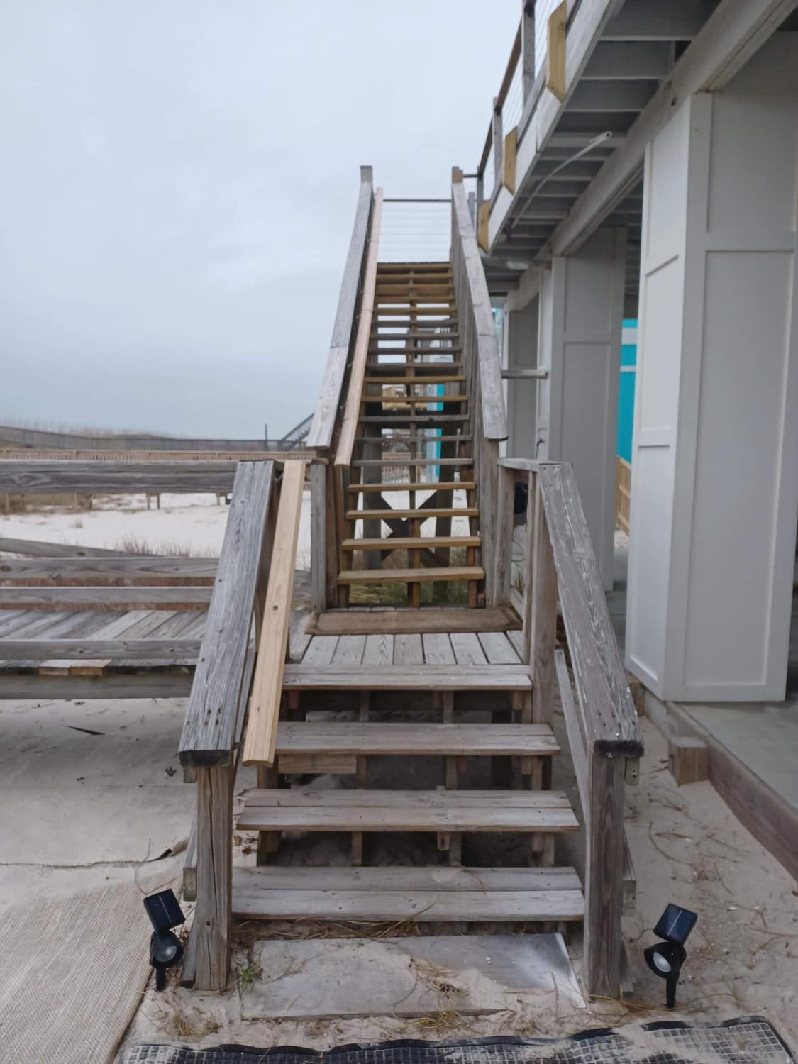 Before Fixing The Stairs On The Beach - Fort Walton Beach, FL - Swear Fence & Lawn Installations LLC