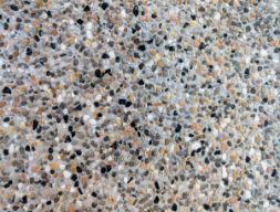 Close-up look of an exposed aggregate concrete driveway surface in Mandurah WA.