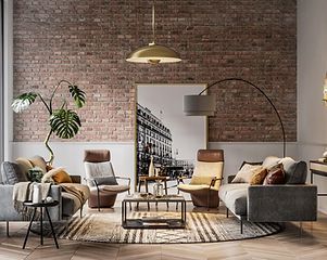 Living room with exposed brick wall, modern furniture, and a large framed photograph.