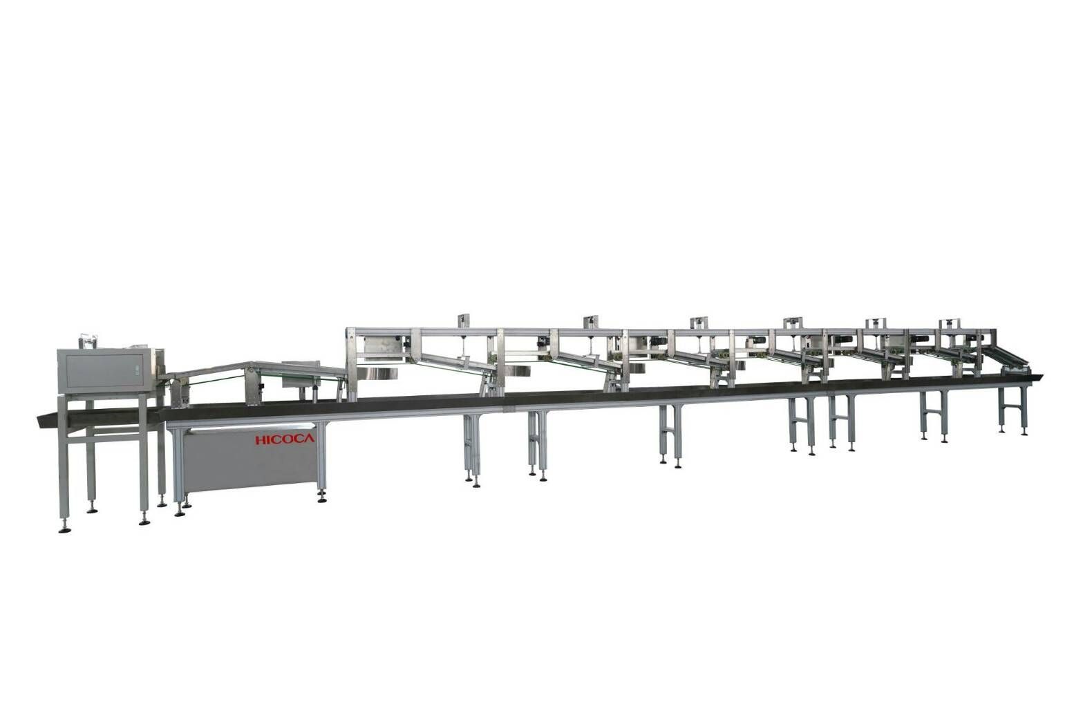A machine is sitting on a conveyor belt on a white background.