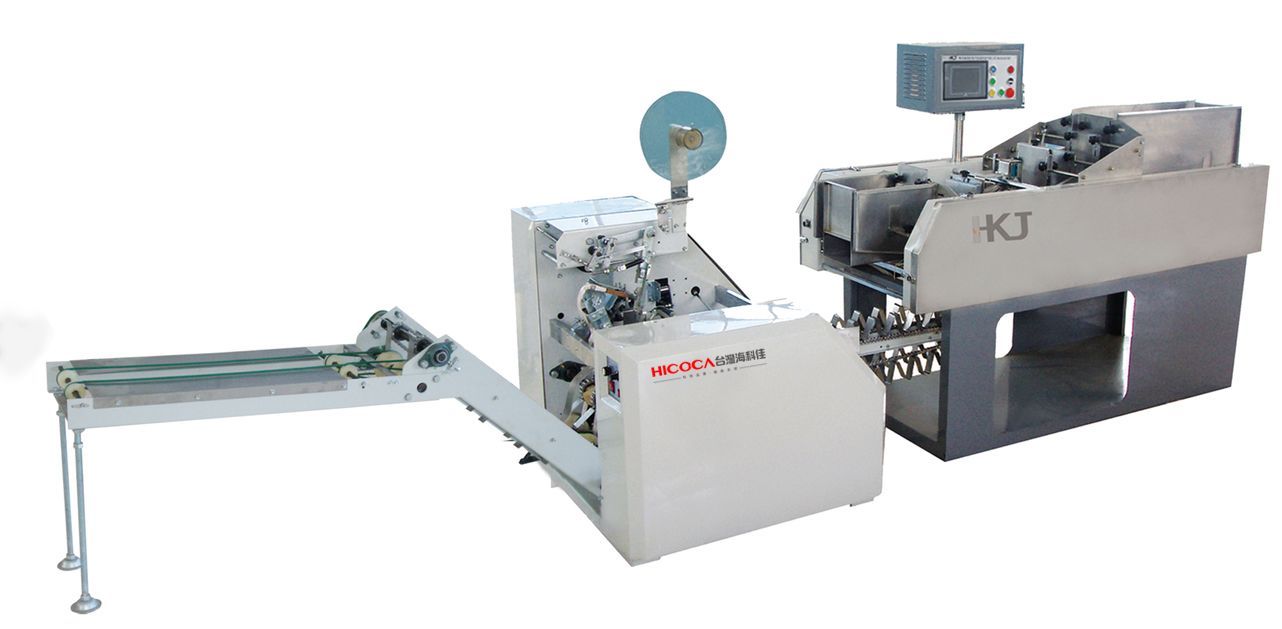 Two machines are sitting next to each other on a white background.