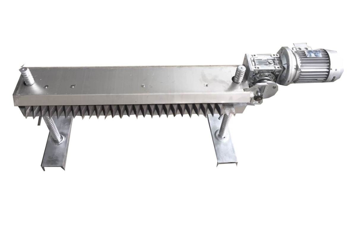A stainless steel machine with a motor attached to it on a white background.
