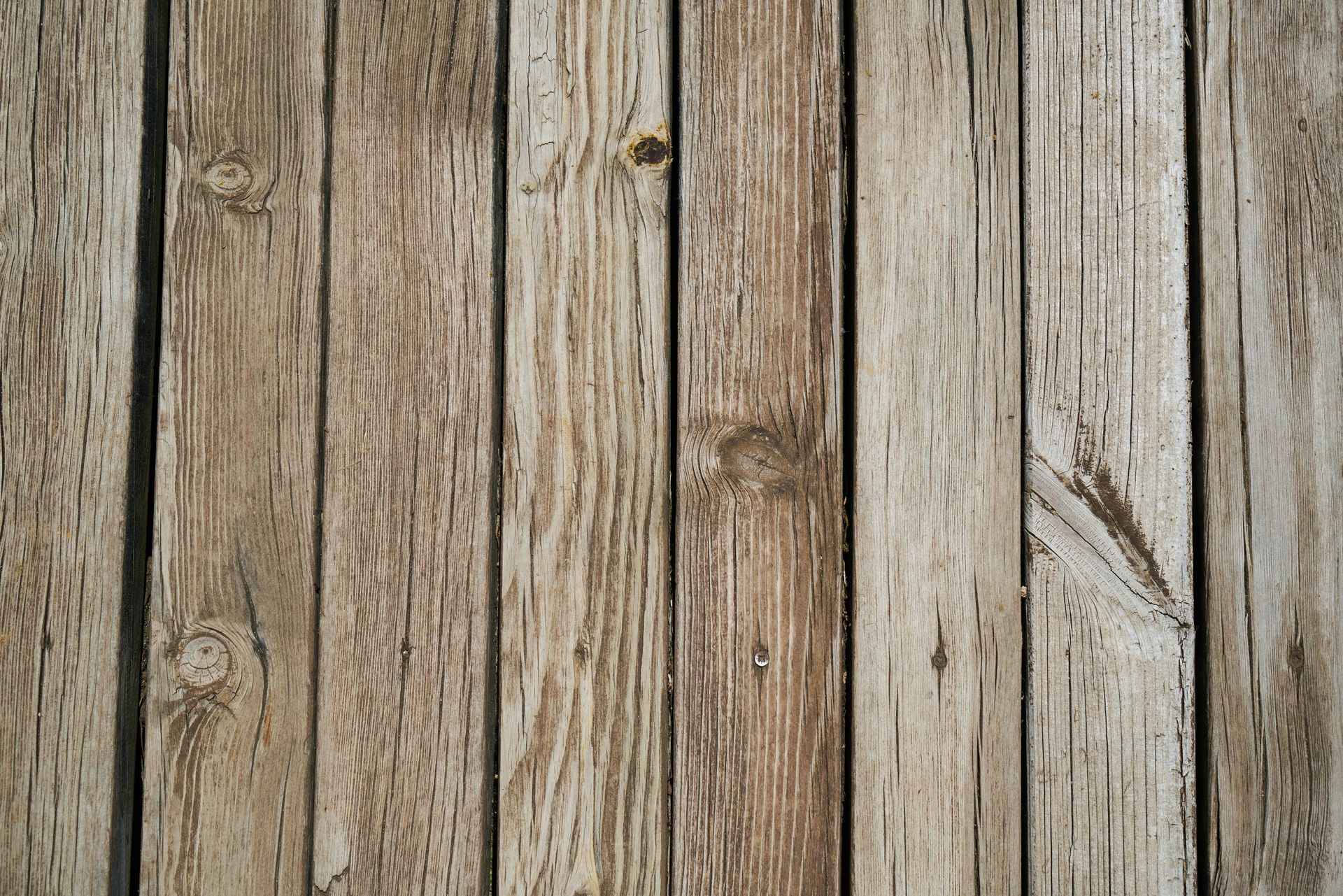 A close up of a wooden surface with a grainy texture.