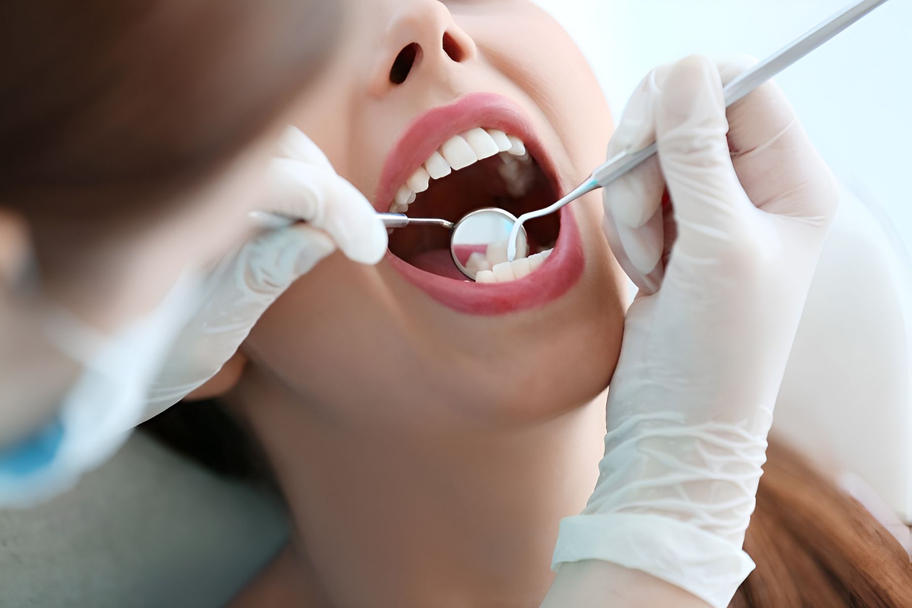 A woman is getting her a regular dental check-up — St Ives Dental Boutique In Saint Ives