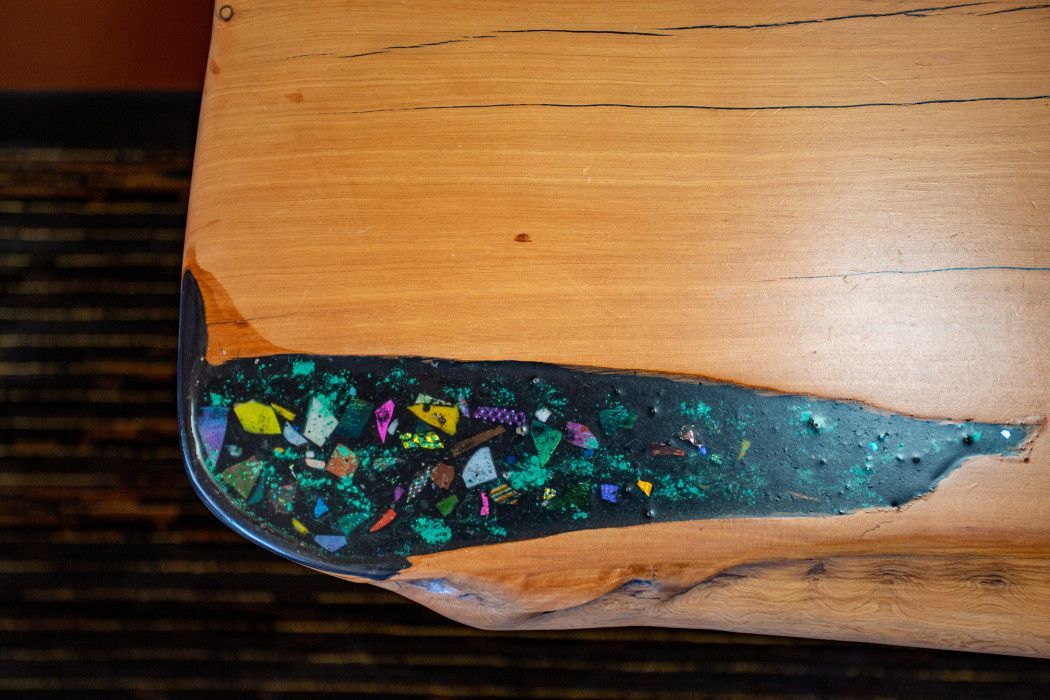 Close-up of a piece of wood with stained glass border, adding rustic charm at Southwest Inn Sedona