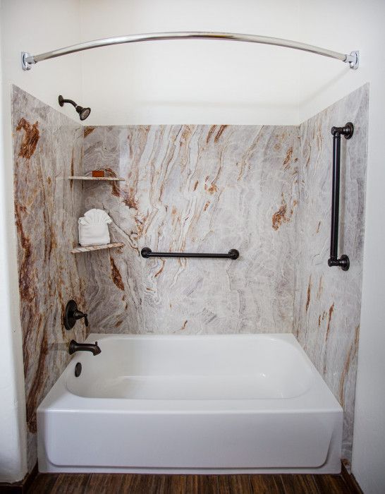 Modern bathroom at Southwest Inn Sedona with bathtub and separate shower