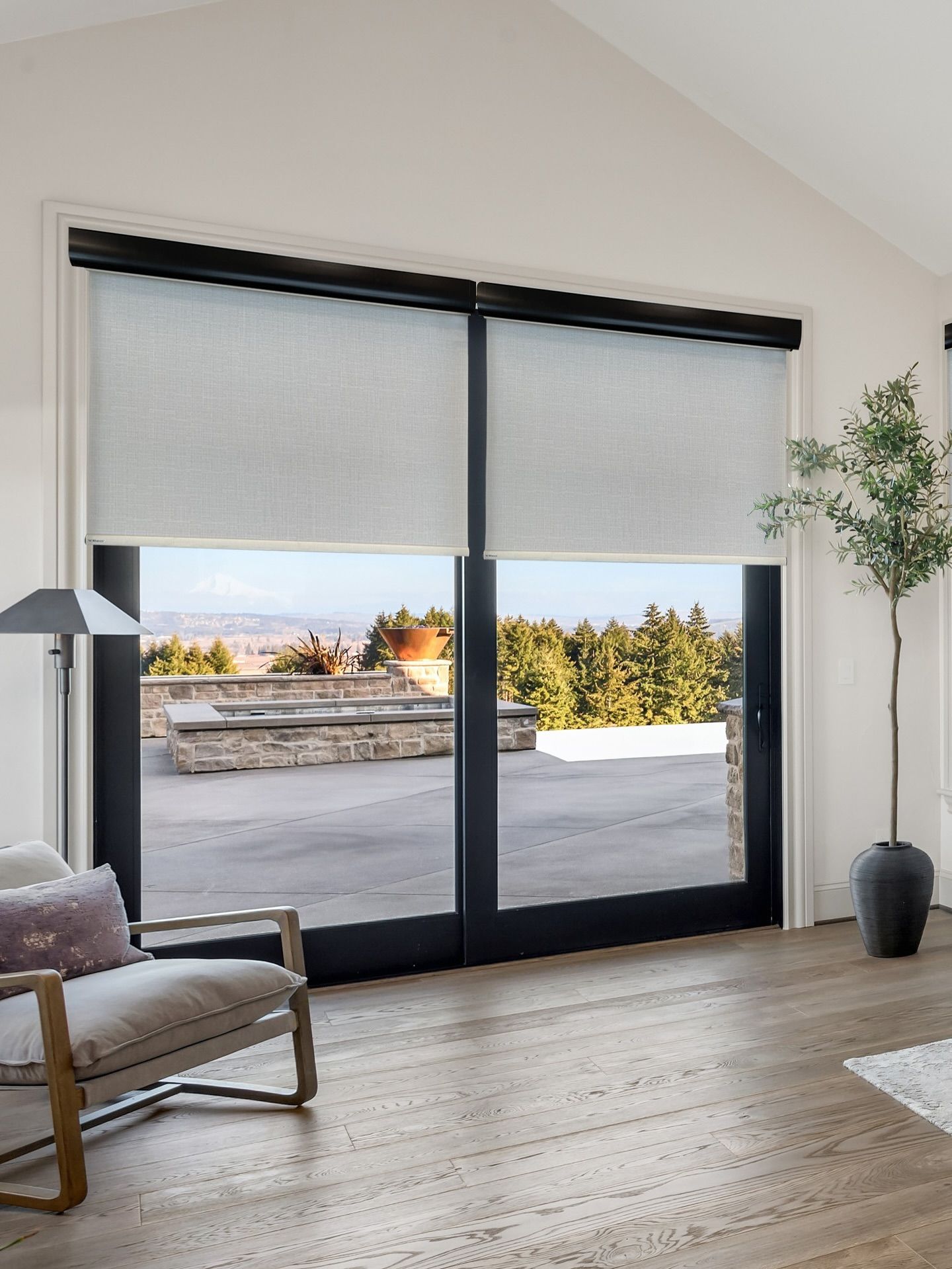 Large windows with light filtering shades