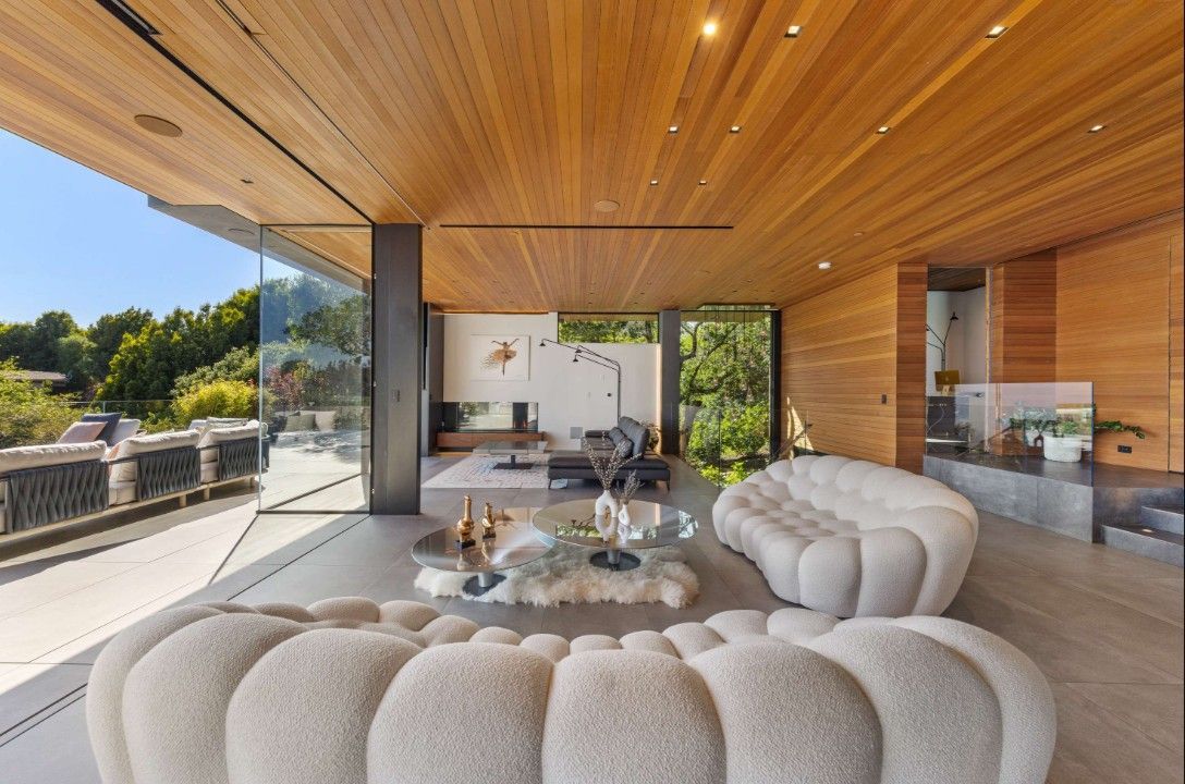 A living room with a couch and a table in it