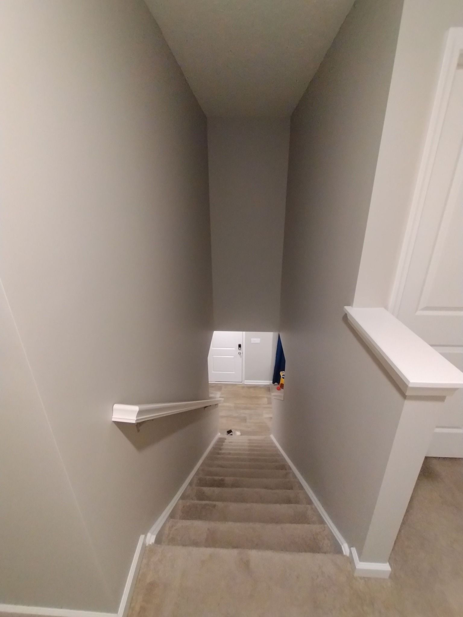 A staircase leading up to the second floor of a house.