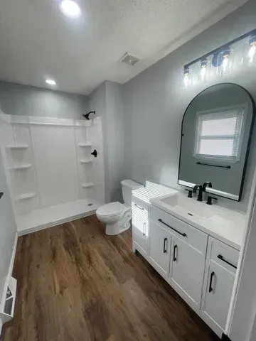 Modern bathroom in MFH Springfield Property Management rental—luxury homes available in Springfield, MO.
