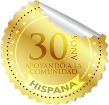 A gold, circular, scalloped sticker reading