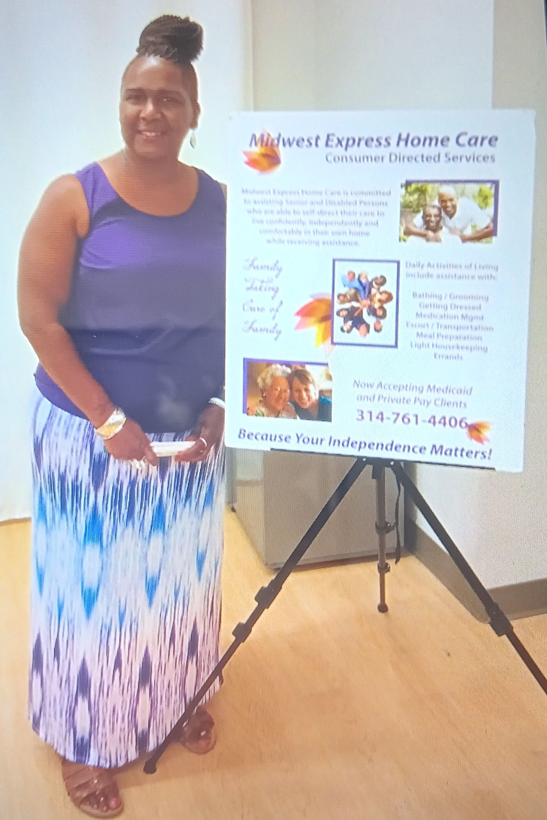 Two individuals seated comfortably on a sofa.