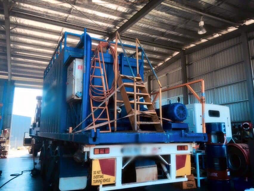 A Blue Truck With a Ladder on the Back is in a Warehouse — All things Diesel NT in Tivendale, NT 