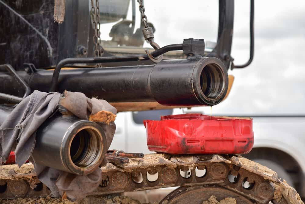 A Close Up of a Bulldozer With Oil Leaking Out of It — All things Diesel NT in Tivendale, NT