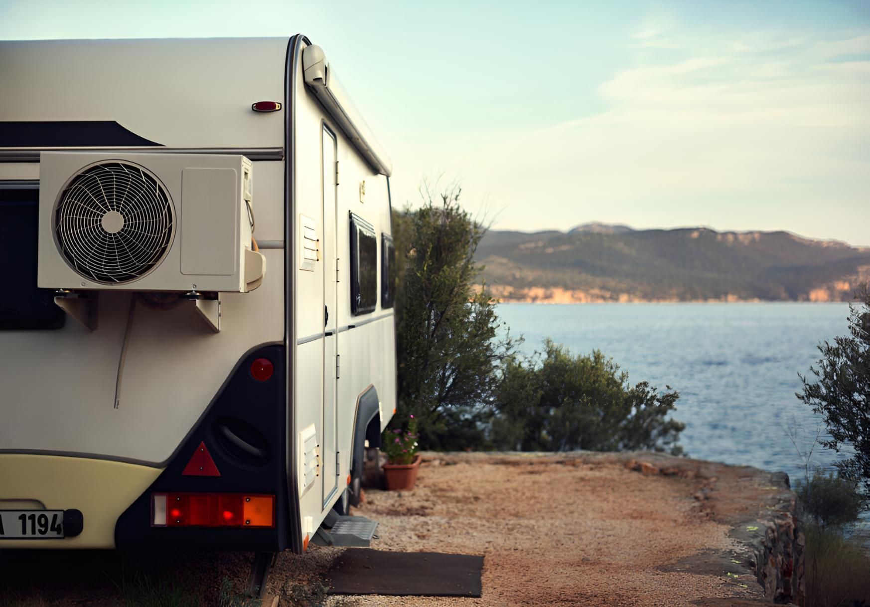 A RV is parked next to a body of water — All things Diesel NT in Tivendale, NT