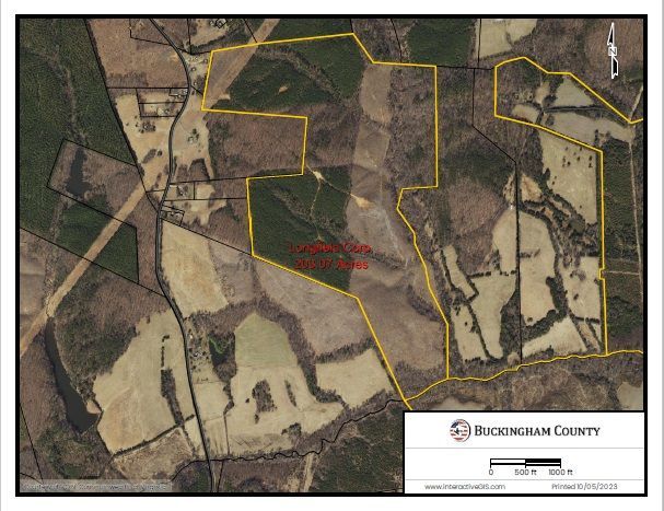 Aerial view of Buckingham County land with property lines and varying terrain, including fields and forests.