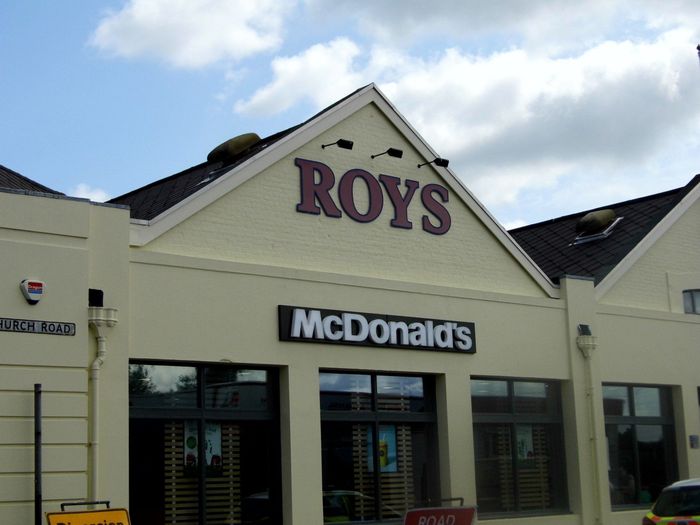 Roy's supermarket and food shop with McDonalds, Wroxham, Norfolk.