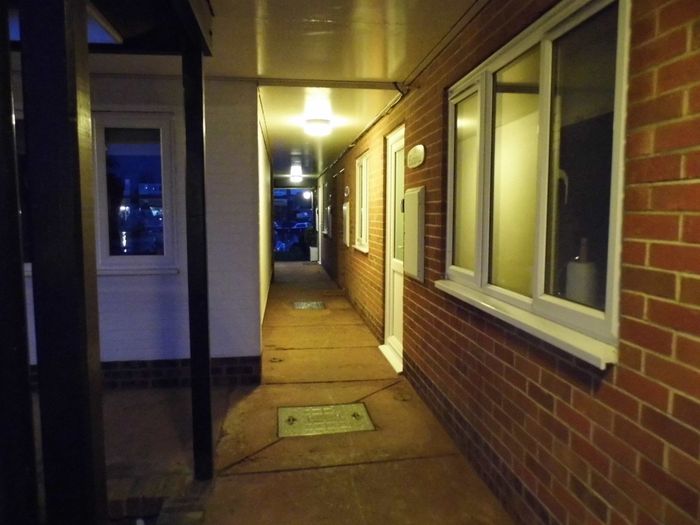 Safe, well lit walkway to entrance of Albion cottage at night.