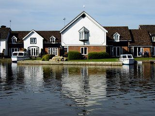 Albion and Wherry Cottage, Peninsula Cottages, on bank of River Bure, |Wroxham, Norfolk.