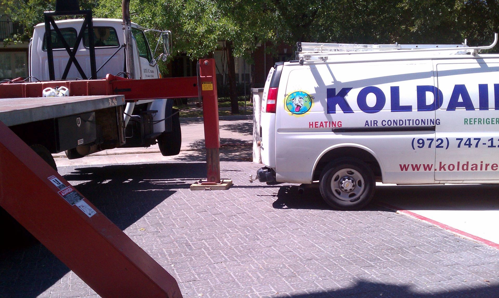 A white van with the word koldaire on it