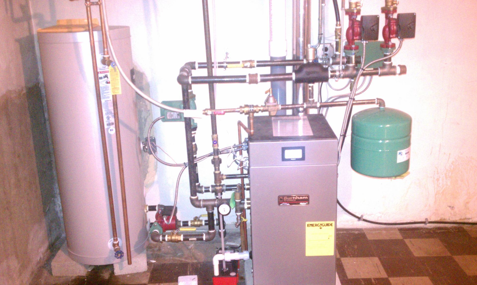 A room with a boiler and a water heater