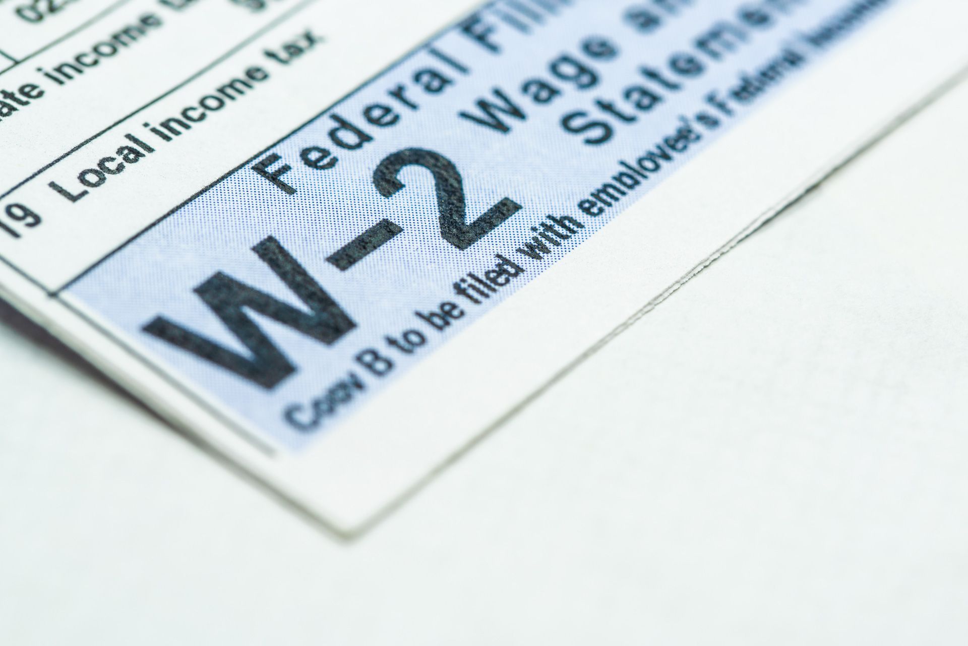 Close-up of a W-2 form, titled 