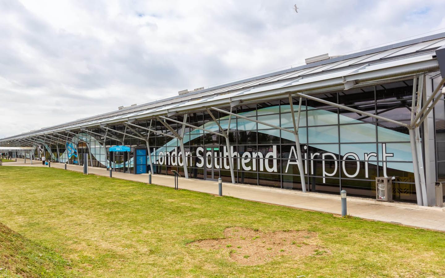 A large building with a sign that says london southend airport.